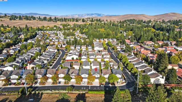 a picture of a bathroom with a bathtub sink shower and mirror