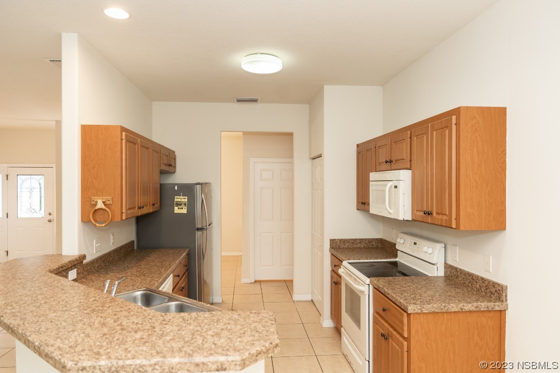 4650 Tree Top Lane Edgewater, FL 32141 - Photo 12 of 35 Gallery Image 12