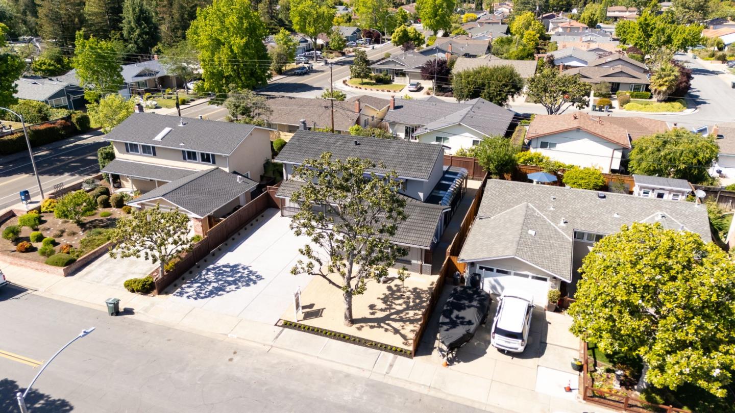 1003 Rosa Avenue Sunnyvale, CA 94086 - Photo 61 of 68 an aerial view of a swimming pool with outdoor seating and mountain view