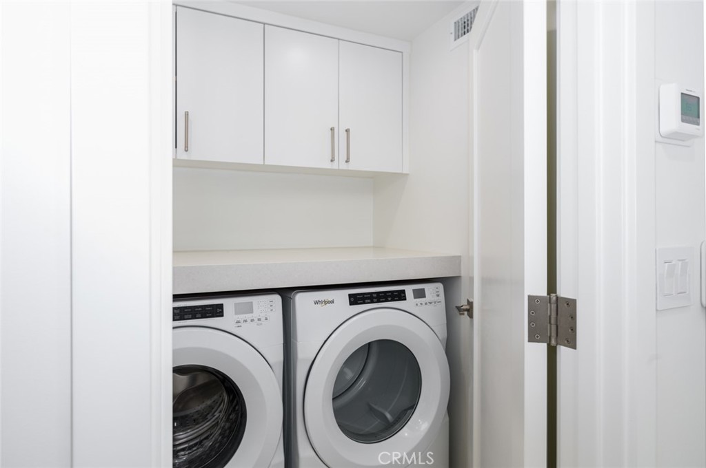 476 Morning Canyon Road Corona del Mar, CA 92625 - Photo 16 of 22 a utility room with dryer and washer
