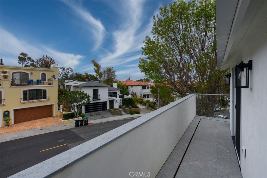 476 Morning Canyon Road Corona del Mar, CA 92625 - Photo 17 of 22 a view of a balcony with many windows