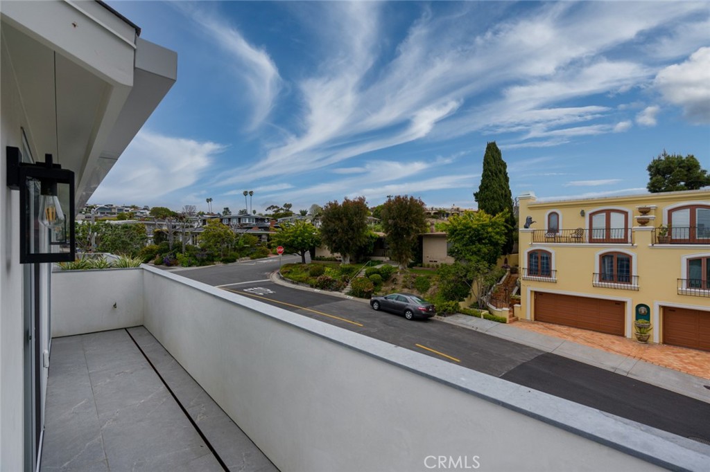 476 Morning Canyon Road Corona del Mar, CA 92625 - Photo 18 of 22 a view of balcony with city view