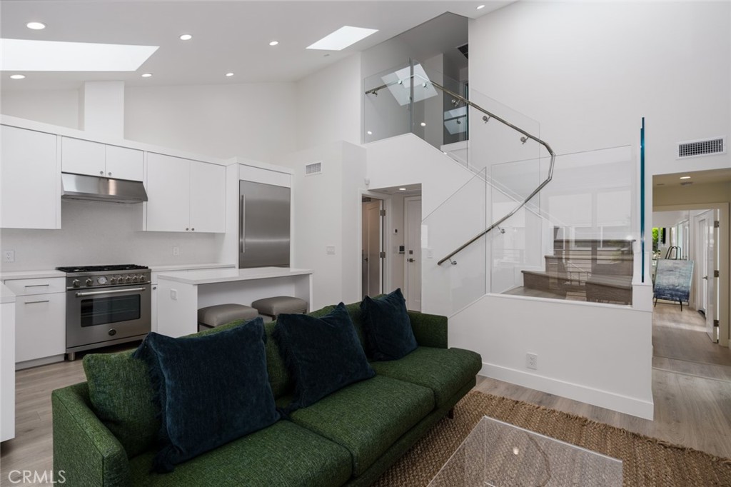 476 Morning Canyon Road Corona del Mar, CA 92625 - Photo 3 of 22 a living room with furniture and wooden floor