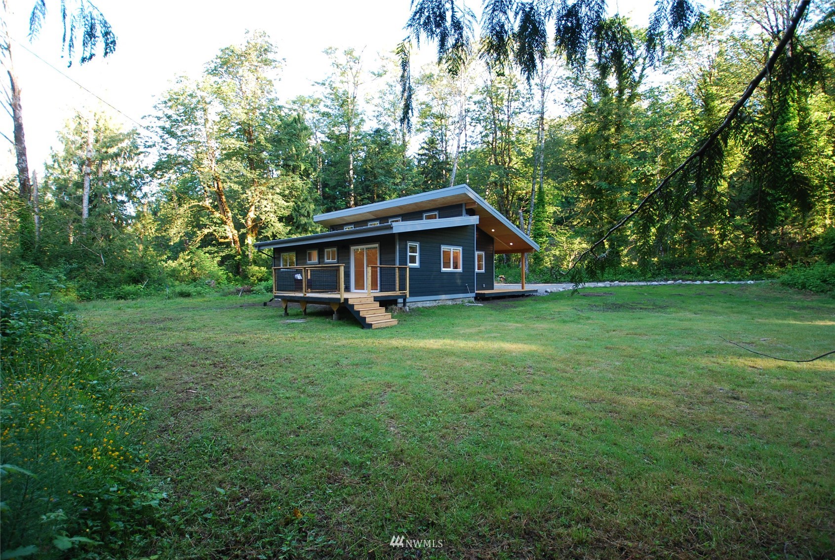 48514 Gold Bar Index Rd Road Index, WA 98256 - Photo 20 of 22 a view of a house with yard and sitting area