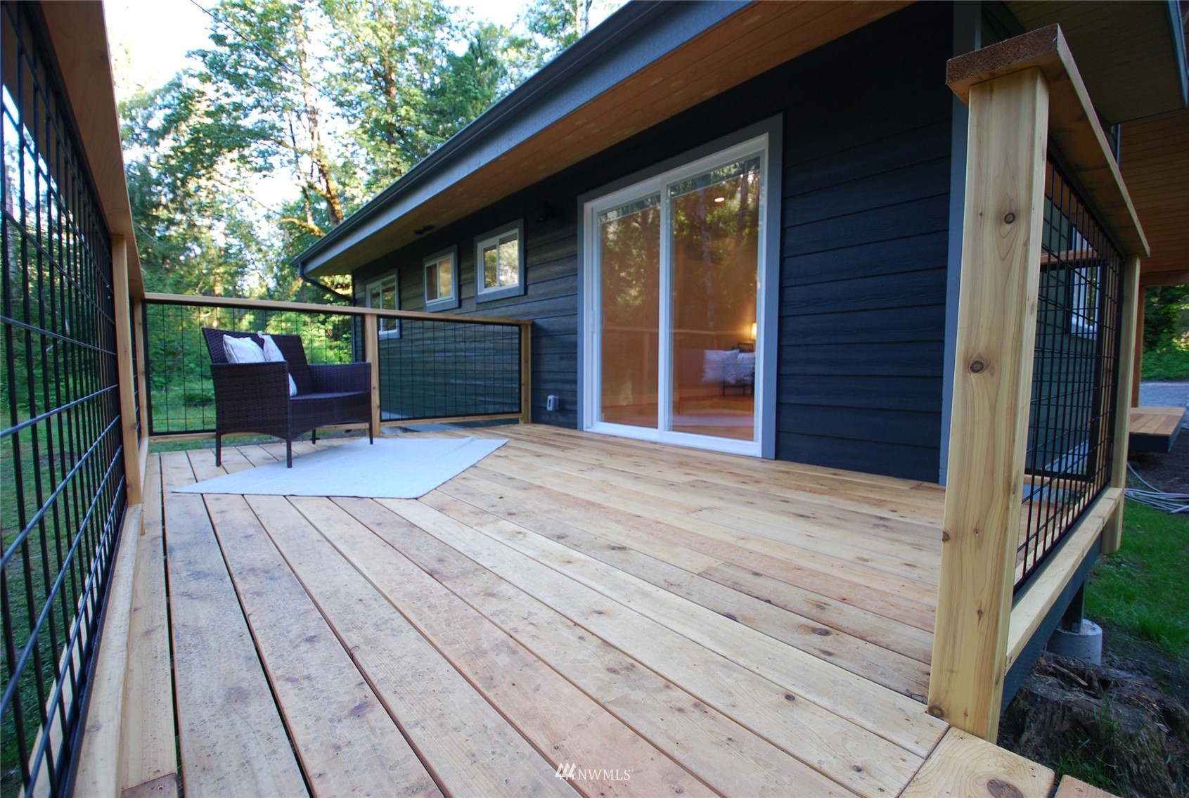 48514 Gold Bar Index Rd Road Index, WA 98256 - Photo 6 of 22 a porch with seating space and yard