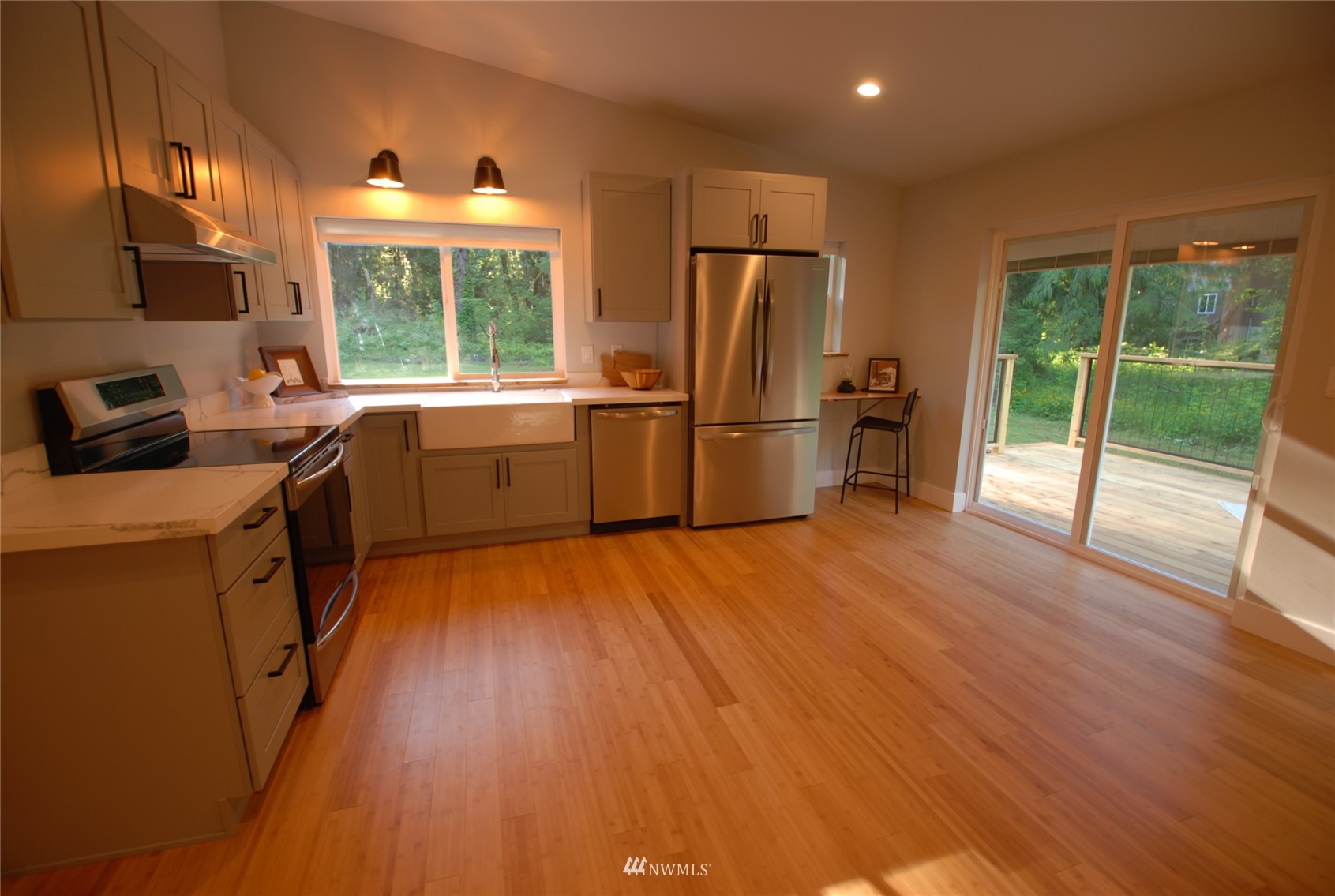 48514 Gold Bar Index Rd Road Index, WA 98256 - Photo 9 of 22 a kitchen with refrigerator a sink and a stove