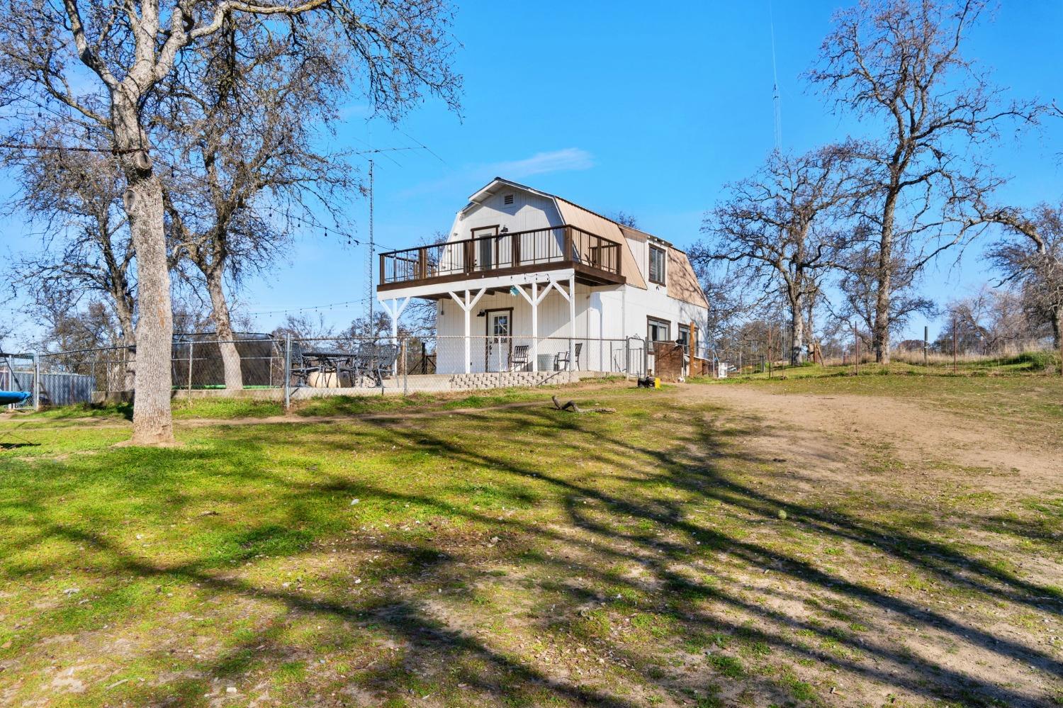 29696 Auberry Road Prather, CA 93651 - Photo 1 of 34 a front view of a house with a yard