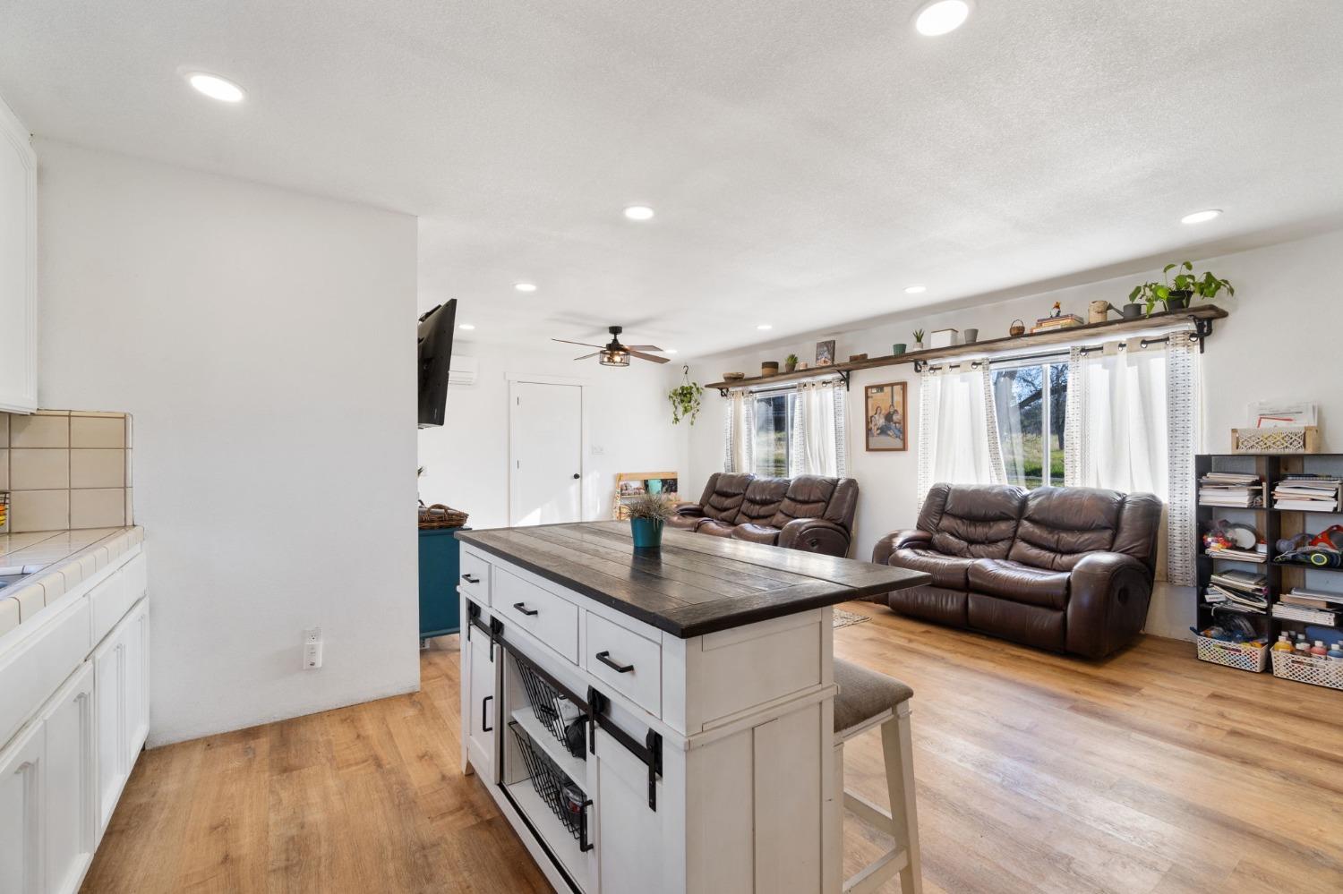 29696 Auberry Road Prather, CA 93651 - Photo 13 of 34 a living room with furniture and a wooden floor