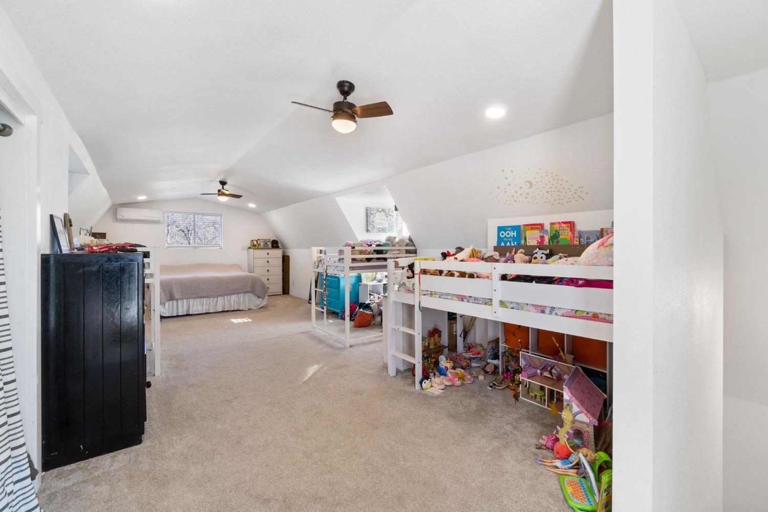29696 Auberry Road Prather, CA 93651 - Photo 17 of 34 a room with furniture and a ceiling fan