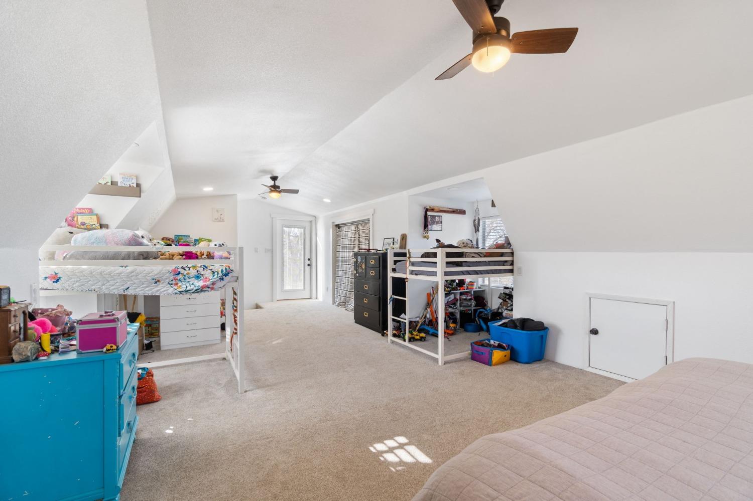 29696 Auberry Road Prather, CA 93651 - Photo 19 of 34 a bedroom with a bed and cabinets