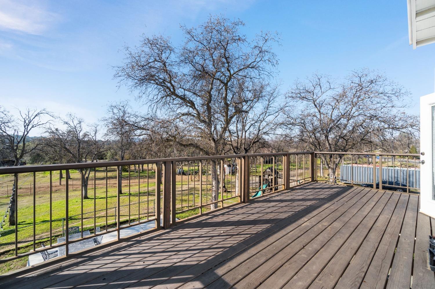 29696 Auberry Road Prather, CA 93651 - Photo 20 of 34 a view of a balcony with wooden floor