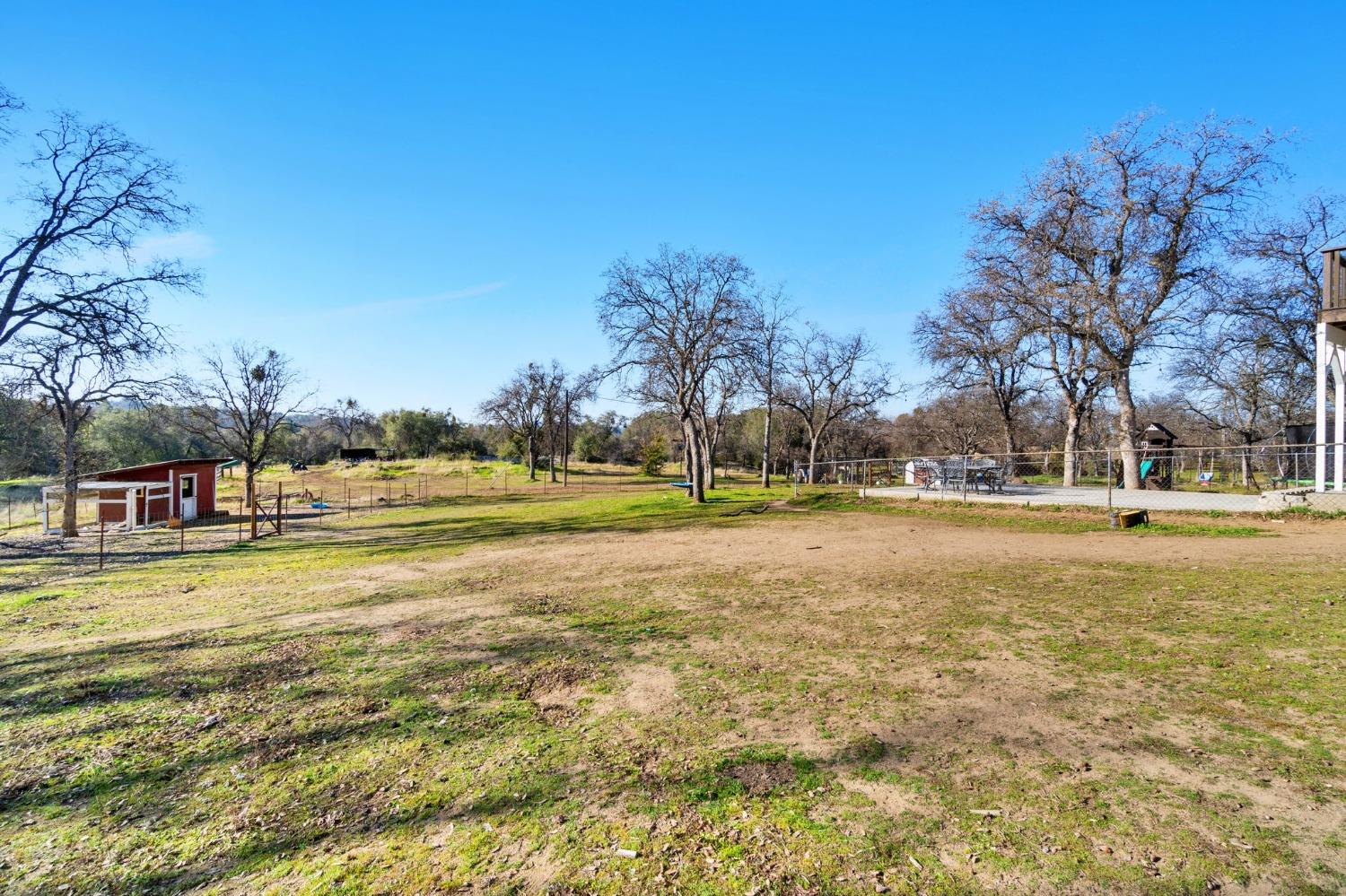 29696 Auberry Road Prather, CA 93651 - Photo 21 of 34 a view of yard with swimming pool and green space