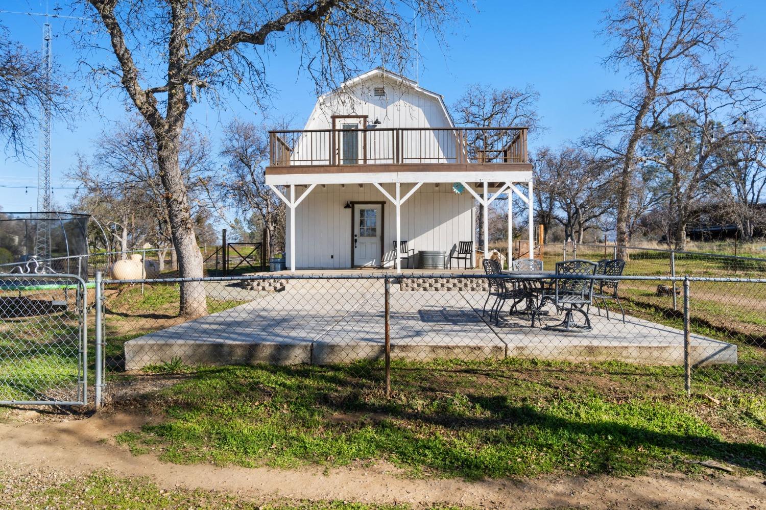 29696 Auberry Road Prather, CA 93651 - Photo 3 of 34 a view of a house with garden and sitting area