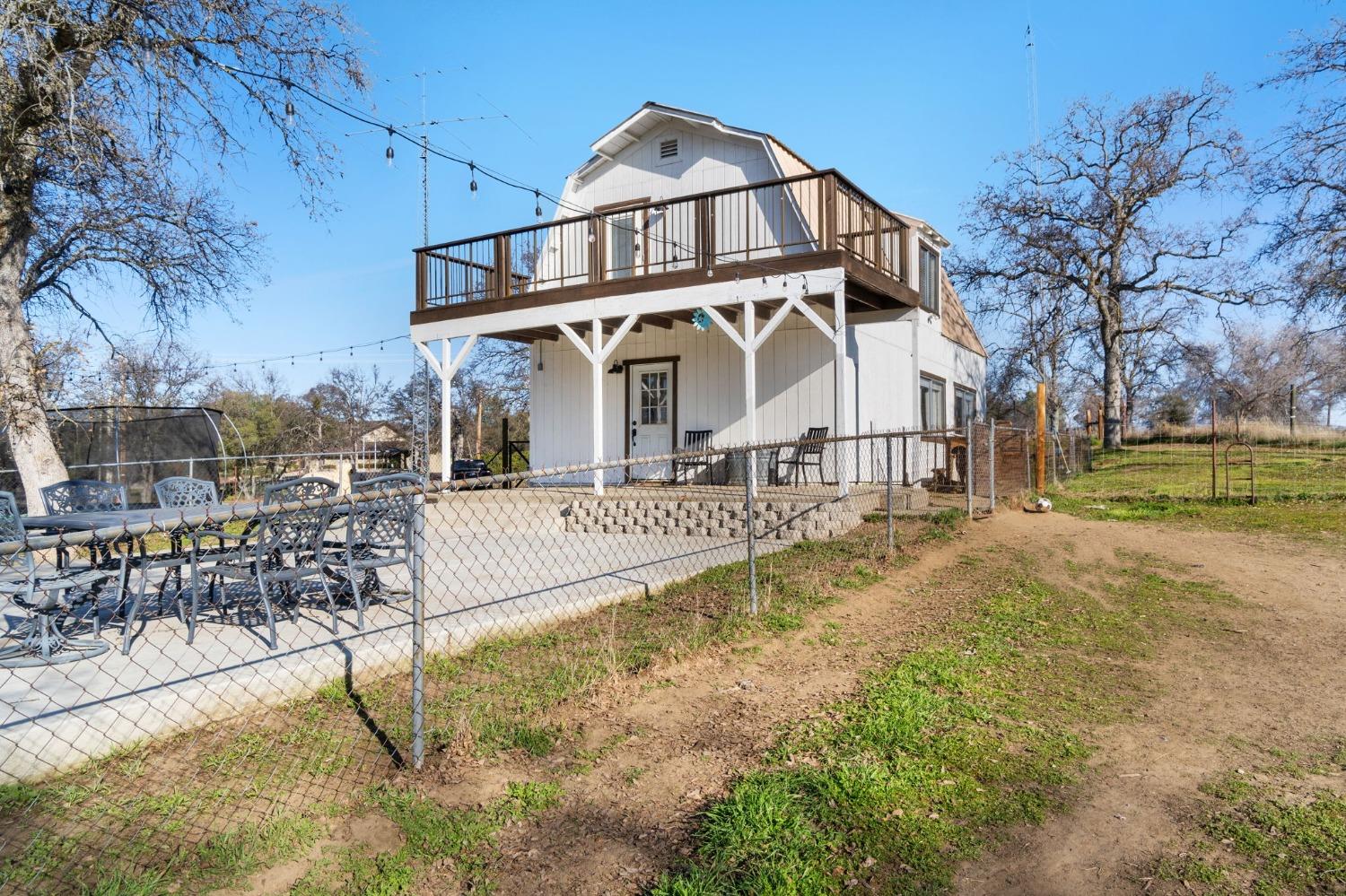 29696 Auberry Road Prather, CA 93651 - Photo 4 of 34 a view of a building with a yard