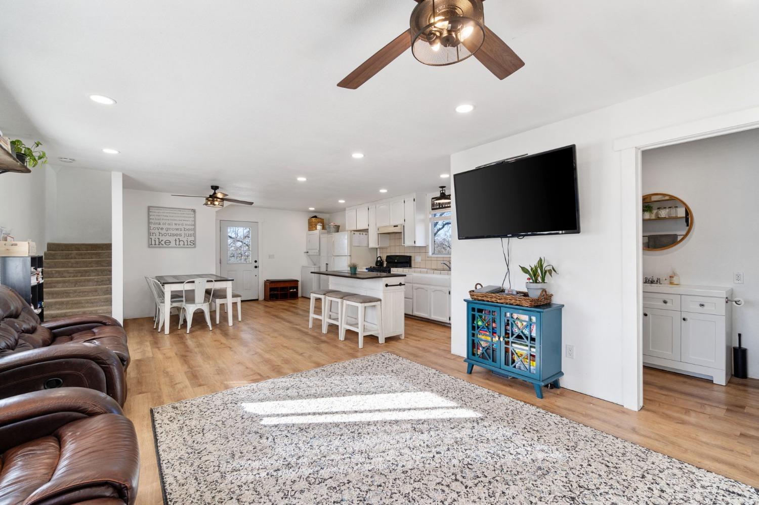 29696 Auberry Road Prather, CA 93651 - Photo 10 of 34 a living room with furniture and a flat screen tv