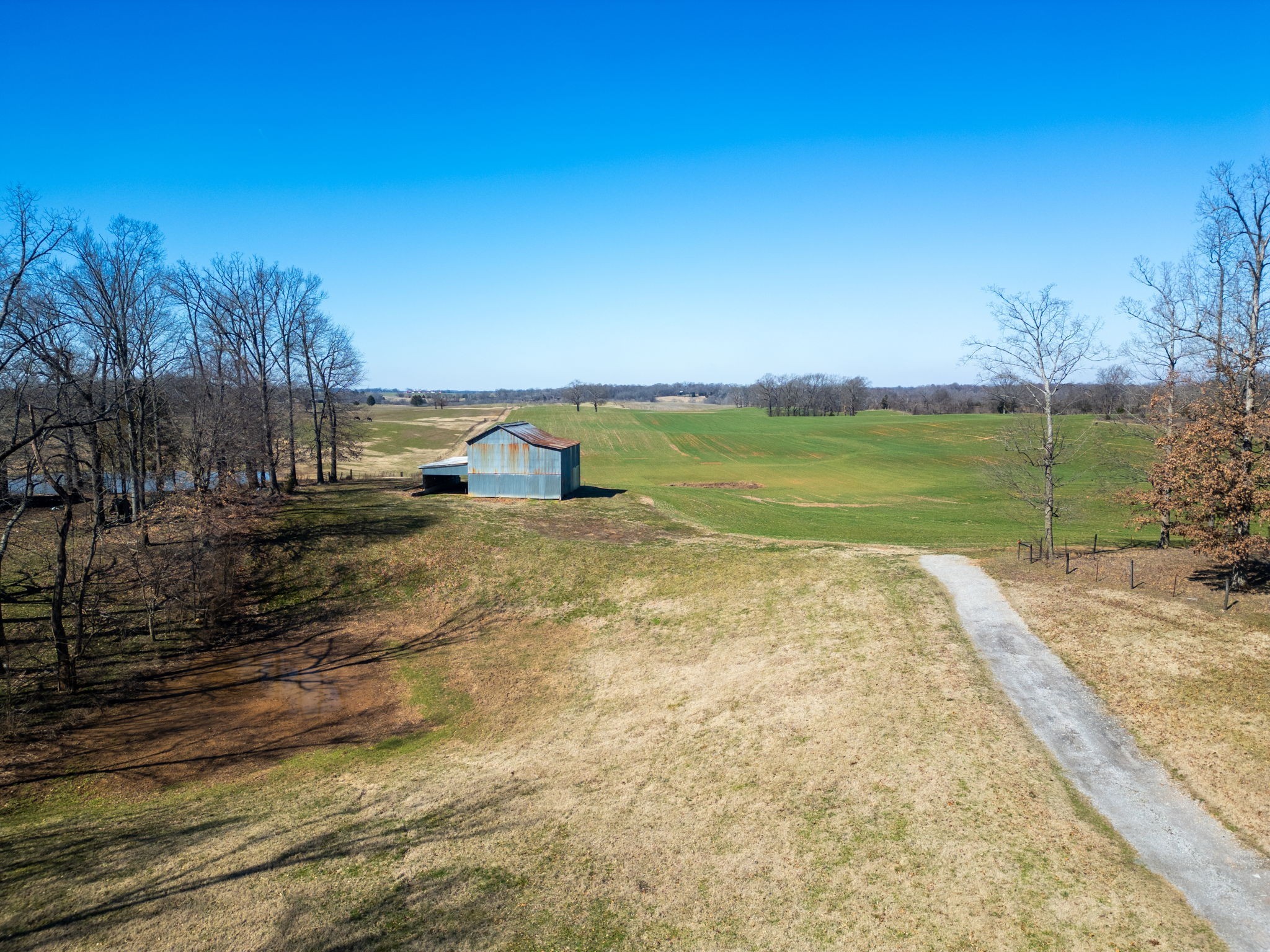 0 Smith Road Cedar Hill, TN 37032 - Photo 2 of 14 a view of a lake with a mountain