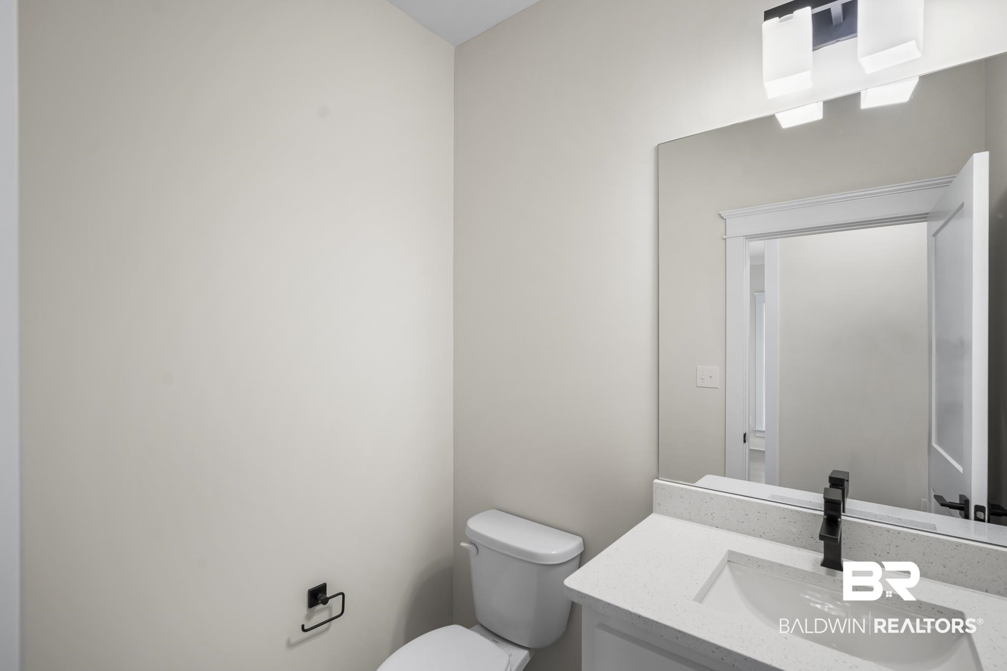 21826 Veranda Boulevard Fairhope, AL 36532 - Photo 30 of 42 Bathroom featuring toilet and vanity