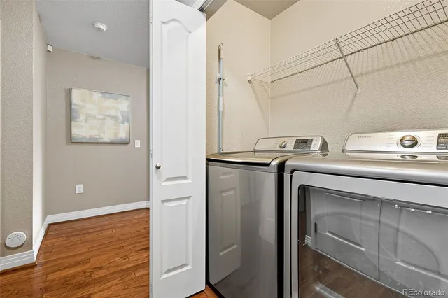 a utility room with washer and dryer
