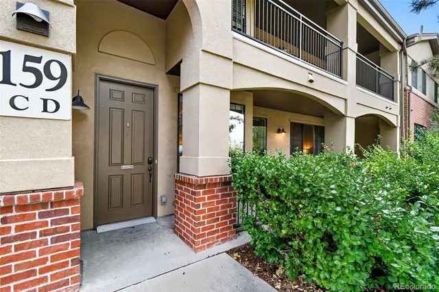 a view of front door of house and stairs