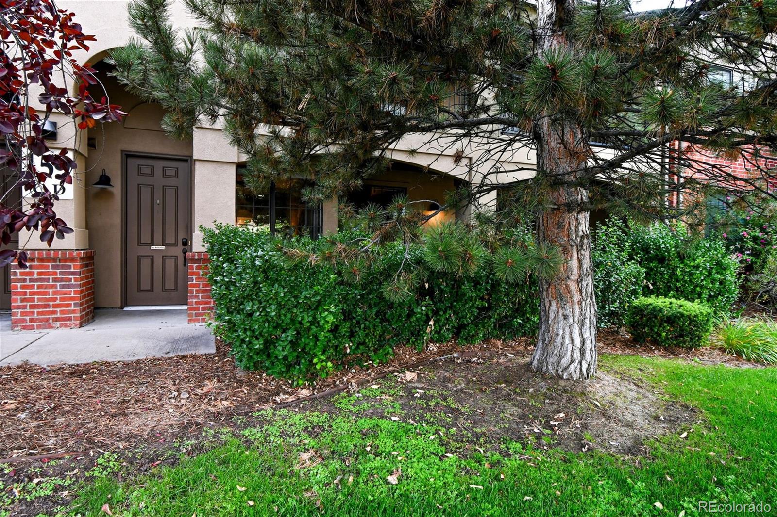 159 Quebec Street, Unit D Denver, CO 80220 - Photo 42 of 49 a backyard of a house with lots of green space