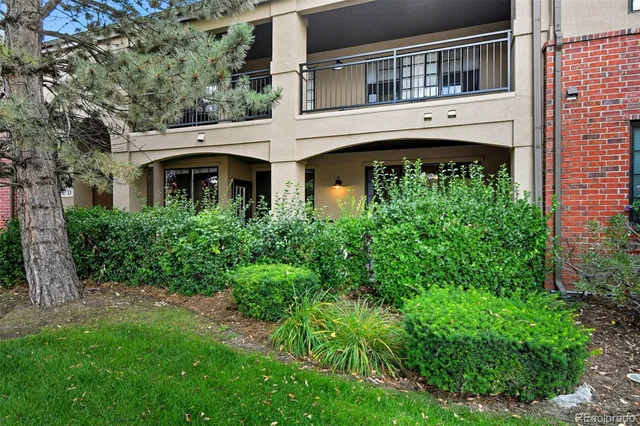 a view of a building with a garden