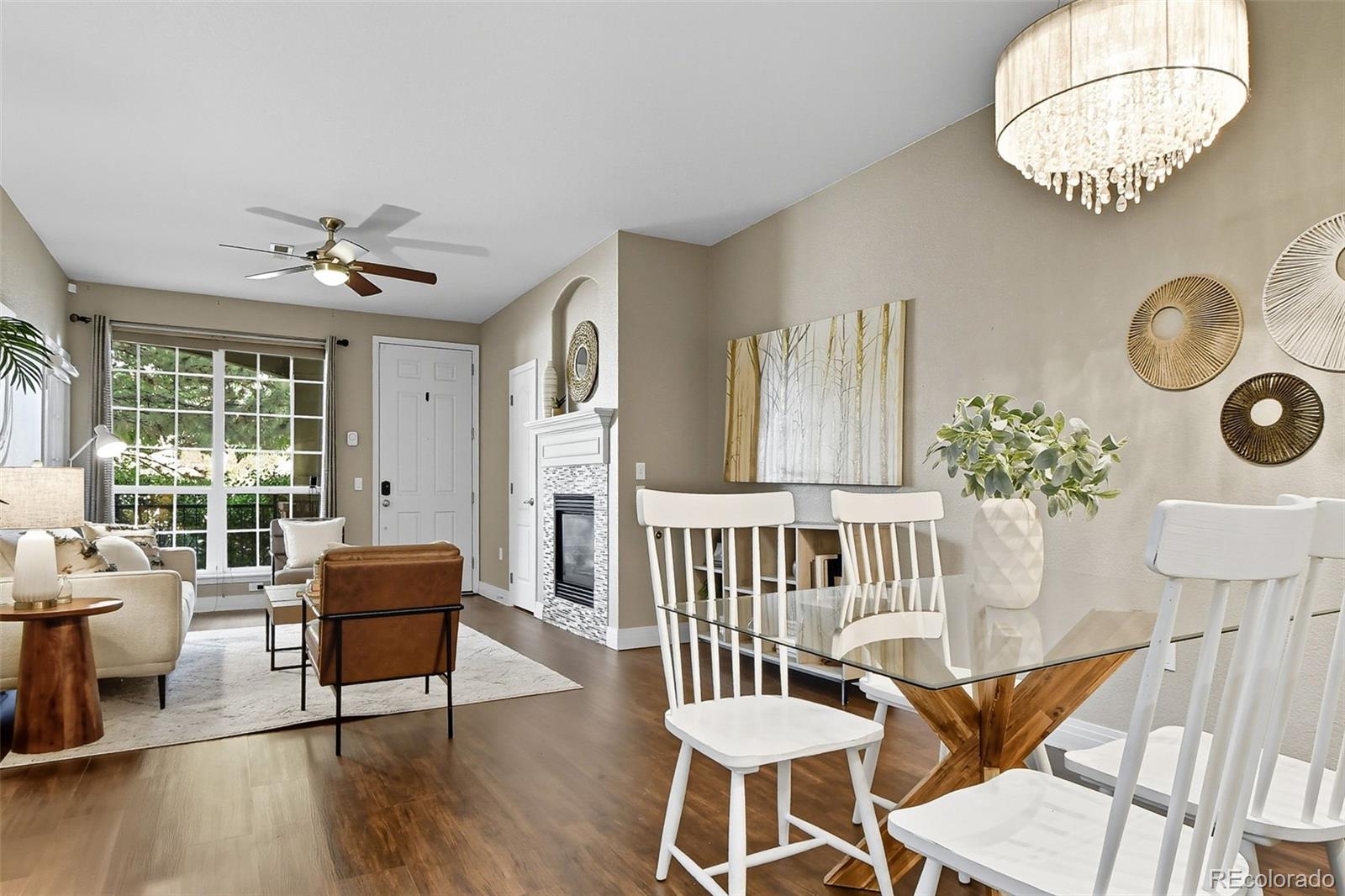159 Quebec Street, Unit D Denver, CO 80220 - Photo 8 of 49 a living room with furniture and wooden floor