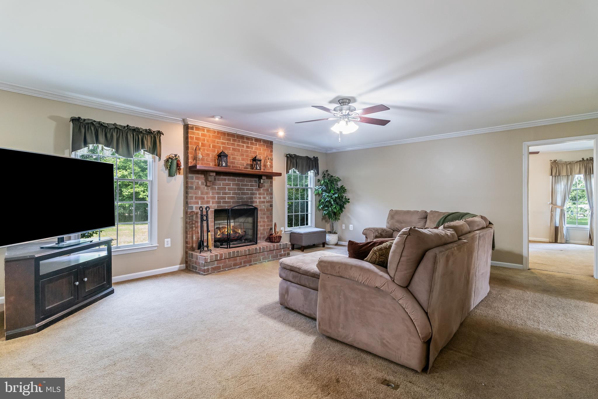 203 Morgans Ridge Court La Plata, MD 20646 - Photo 27 of 59 a living room with furniture and a flat screen tv