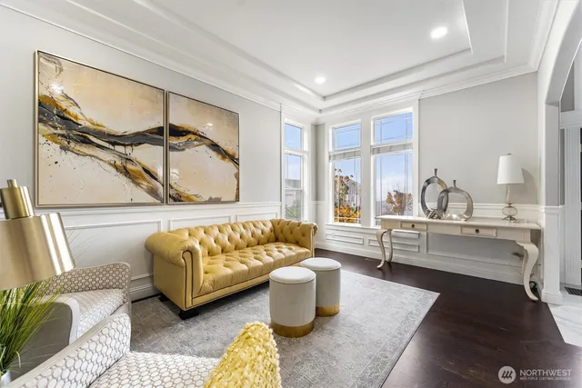 a workspace with furniture and a window