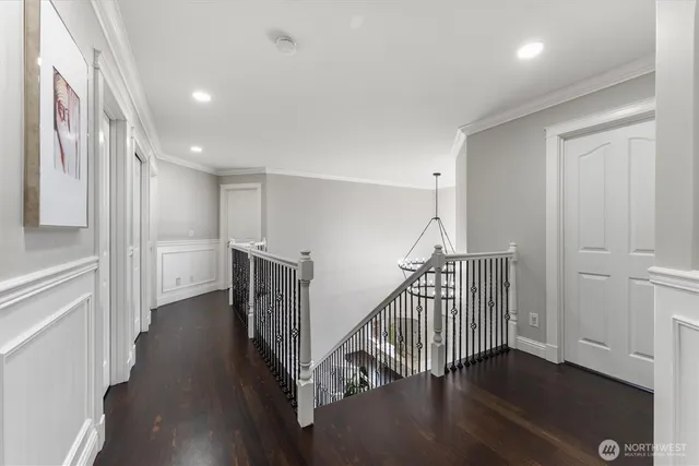 a view of a hallway with stairs