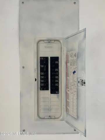 a view of a room with rack on the wall