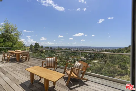 a view of a terrace with seating space