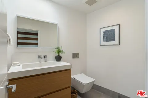 a view of a hallway with washer and dryer