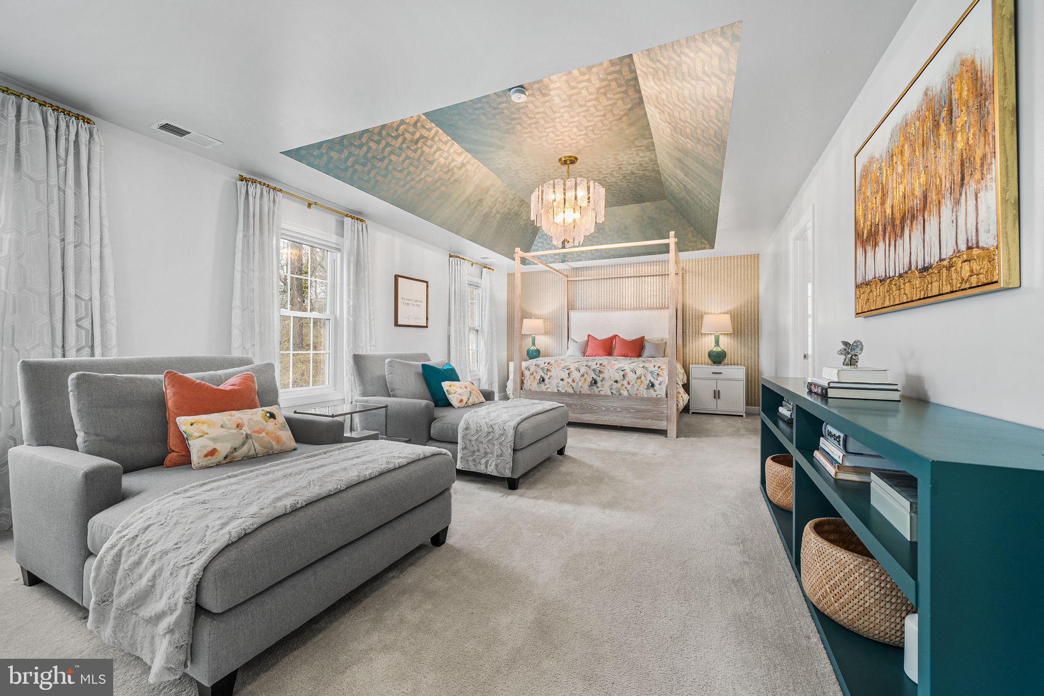 1232 Shenandoah Road Alexandria, VA 22308 - Photo 17 of 50 a bedroom with furniture and a chandelier