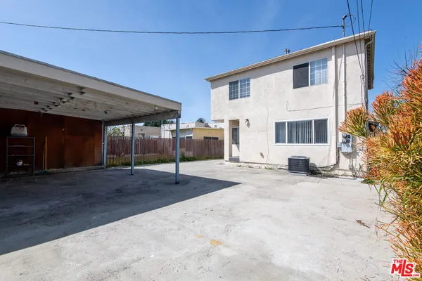 a view of a house with a patio