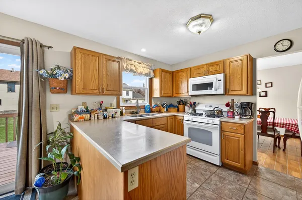 $309,900 | 2704 Brighton Lane, Bloomington, IL 61704
