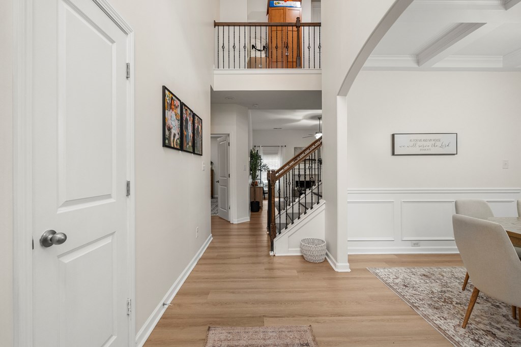 84 Dunley Court Ellerslie, GA 31807 - Photo 4 of 44 a hallway with wooden floor and windows