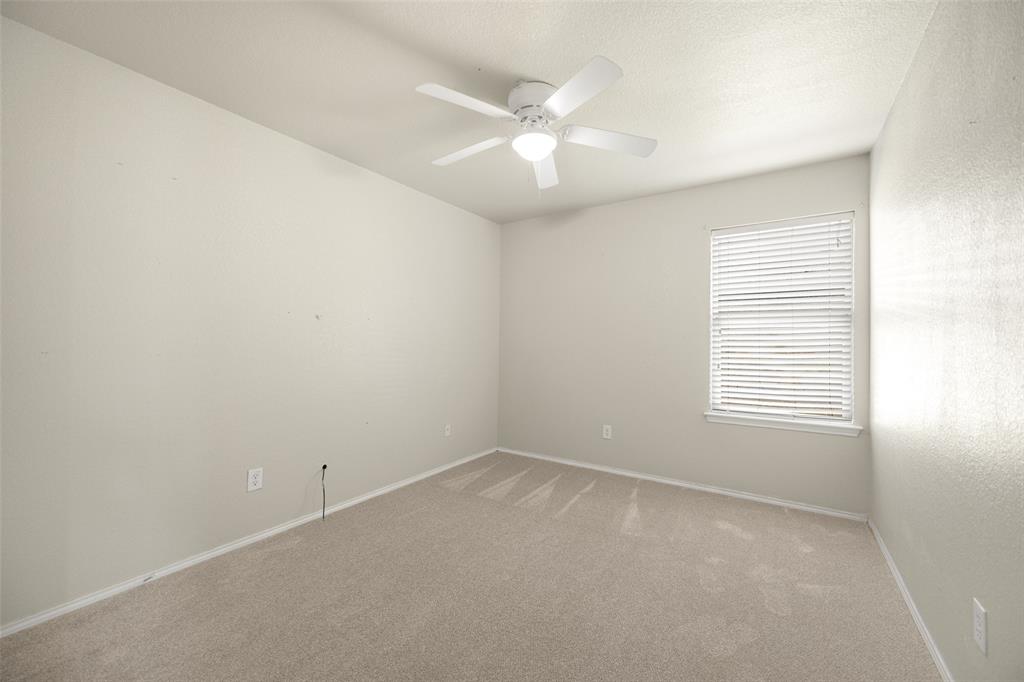 324 Meadow Ridge Drive Anna, TX 75409 - Photo 22 of 32 Secondary bedroom #1 with fresh carpet