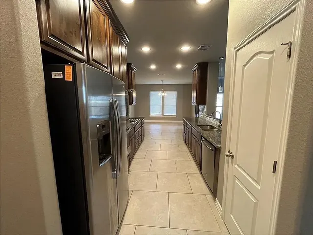 a bathroom with a tub and shower