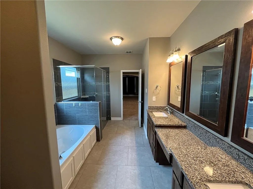 2229 Ruby Drive Corpus Christi, TX 78414 - Photo 2 of 5 a bathroom with a tub and shower