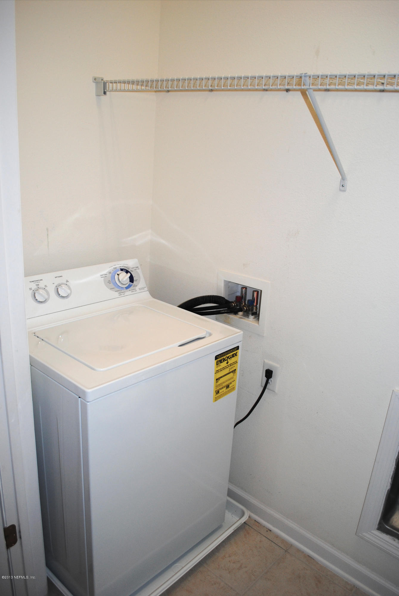 584 Crystal Way Orange Park, FL 32065 - Photo 13 of 22 a utility room with dryer and washer