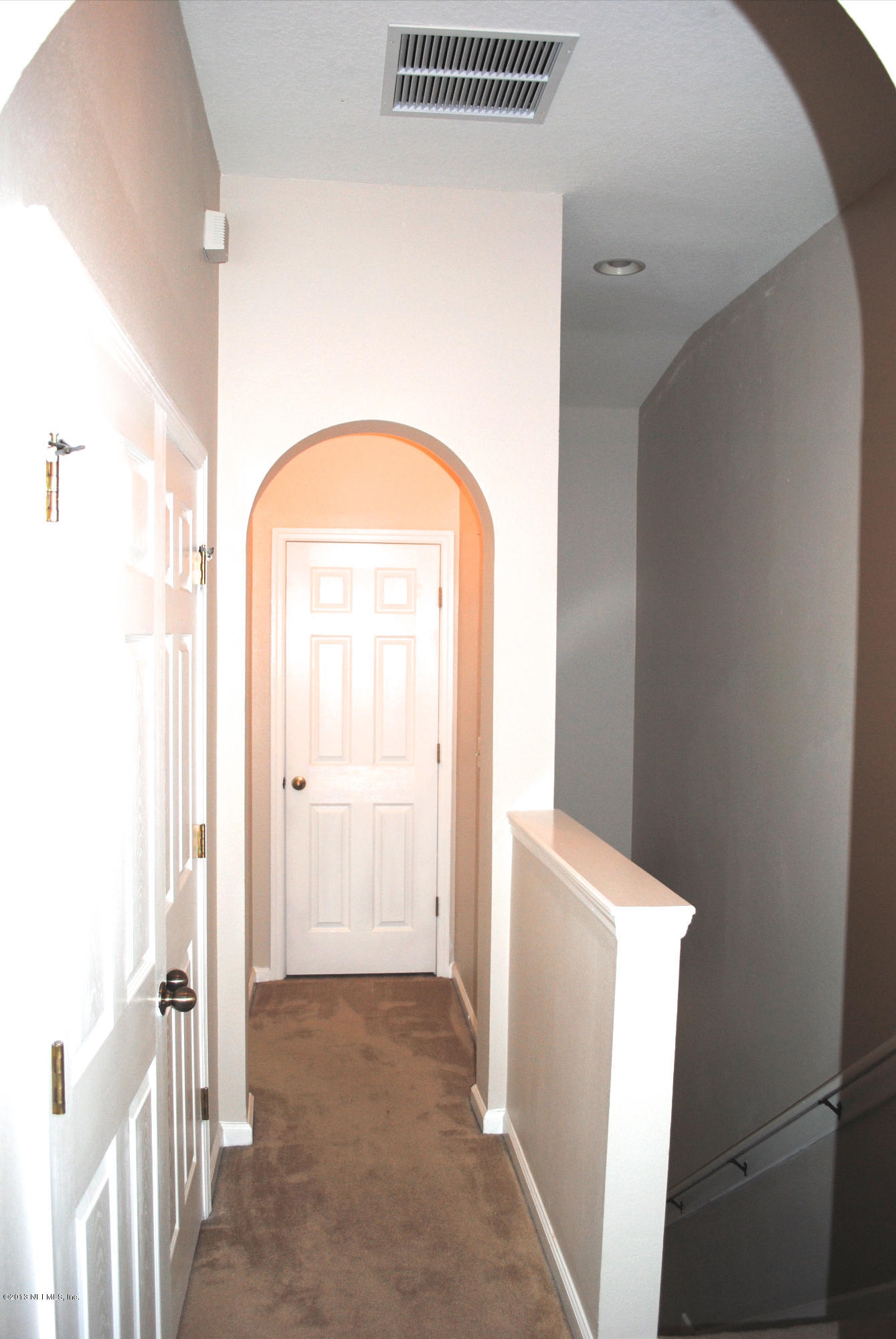 584 Crystal Way Orange Park, FL 32065 - Photo 22 of 22 a view of an entryway with wooden floor