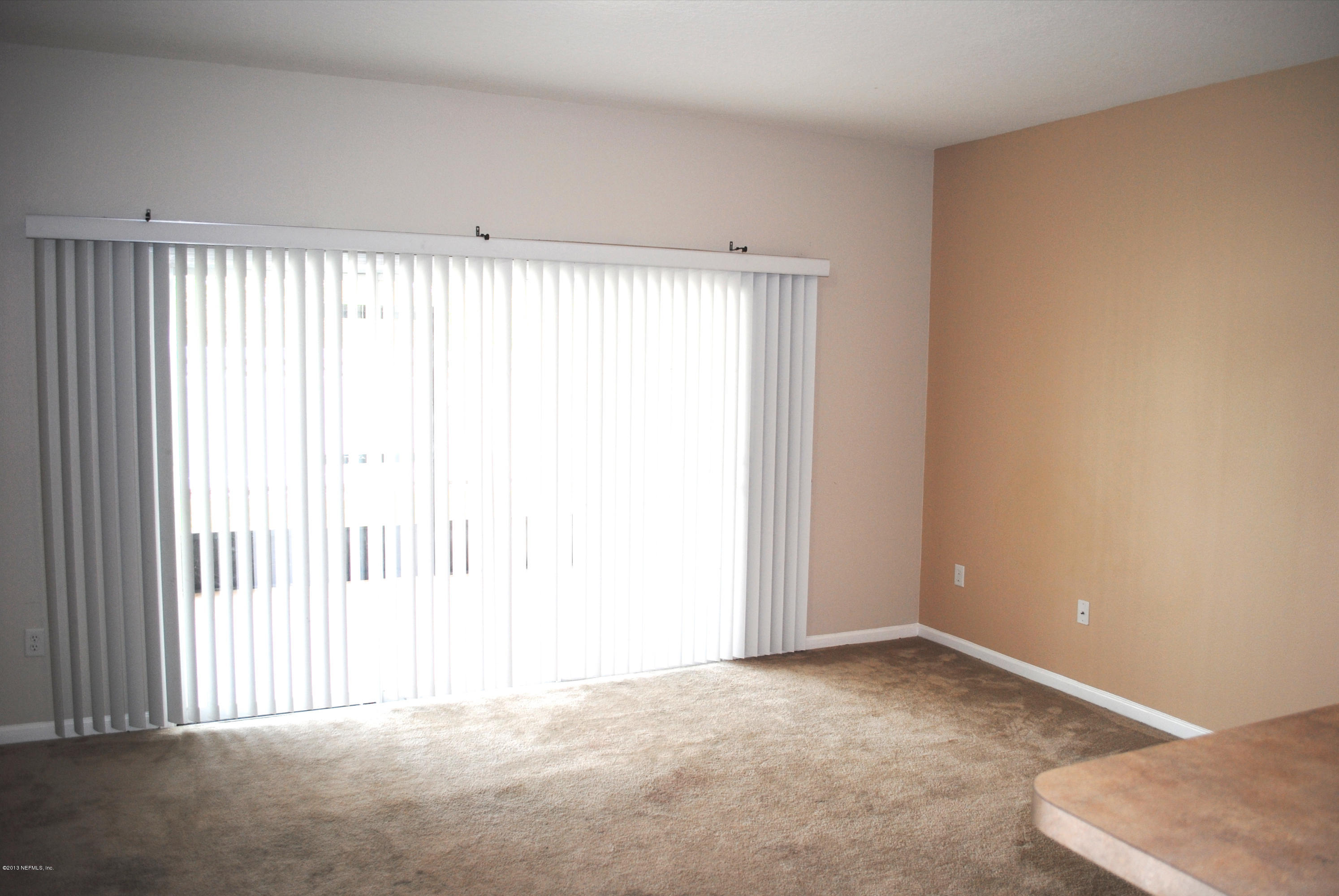 584 Crystal Way Orange Park, FL 32065 - Photo 5 of 22 an empty room with windows