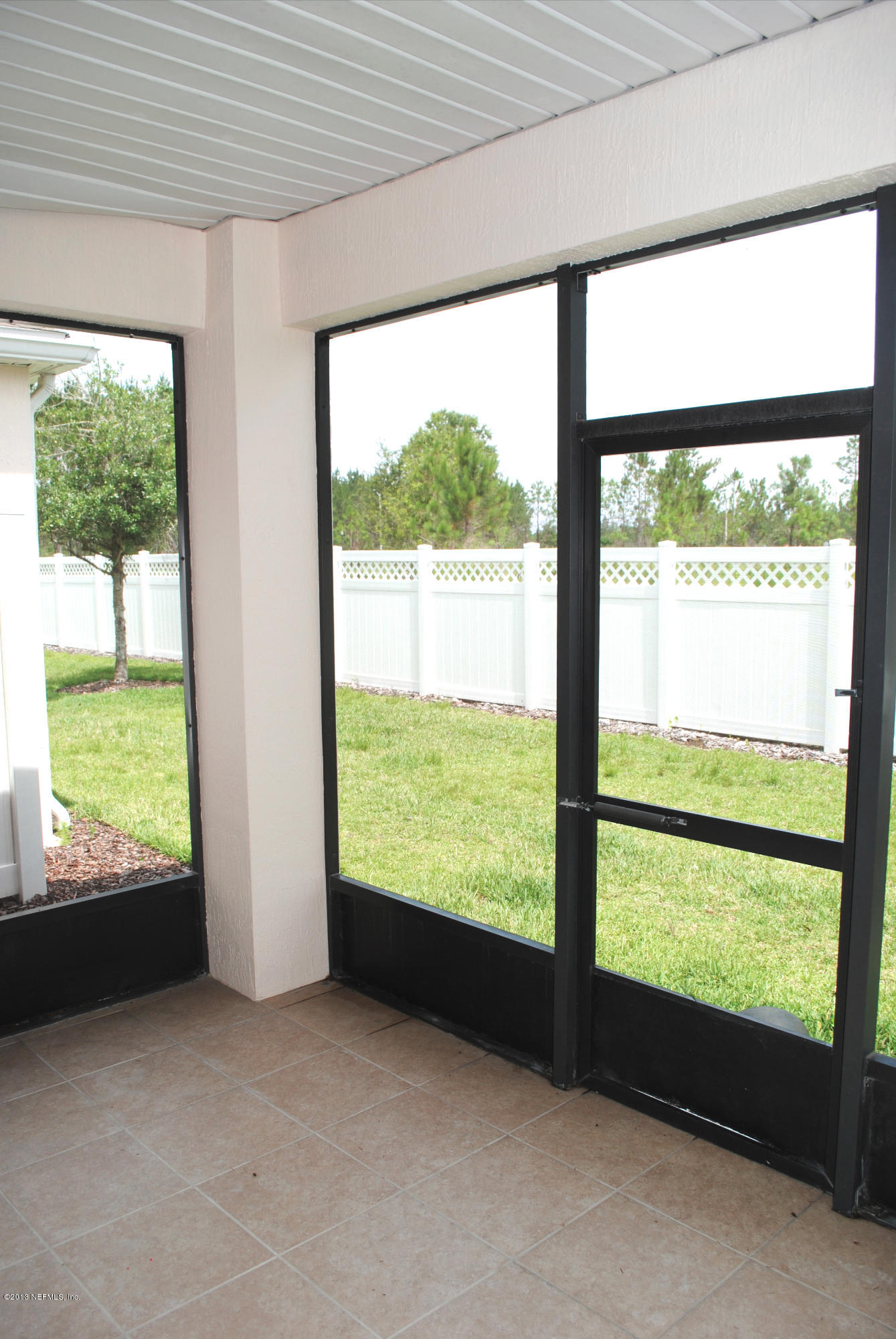 584 Crystal Way Orange Park, FL 32065 - Photo 6 of 22 a view of an outdoor room with a large window