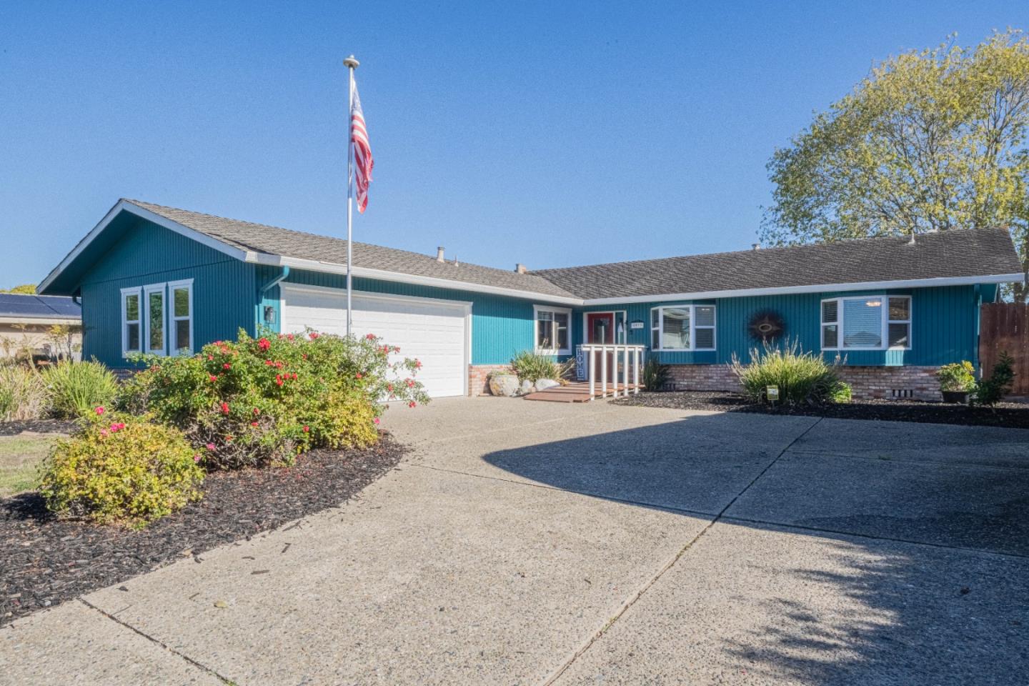 9919 Mimosa Path Salinas, CA 93907 - Photo 1 of 39 a front view of a house with garden