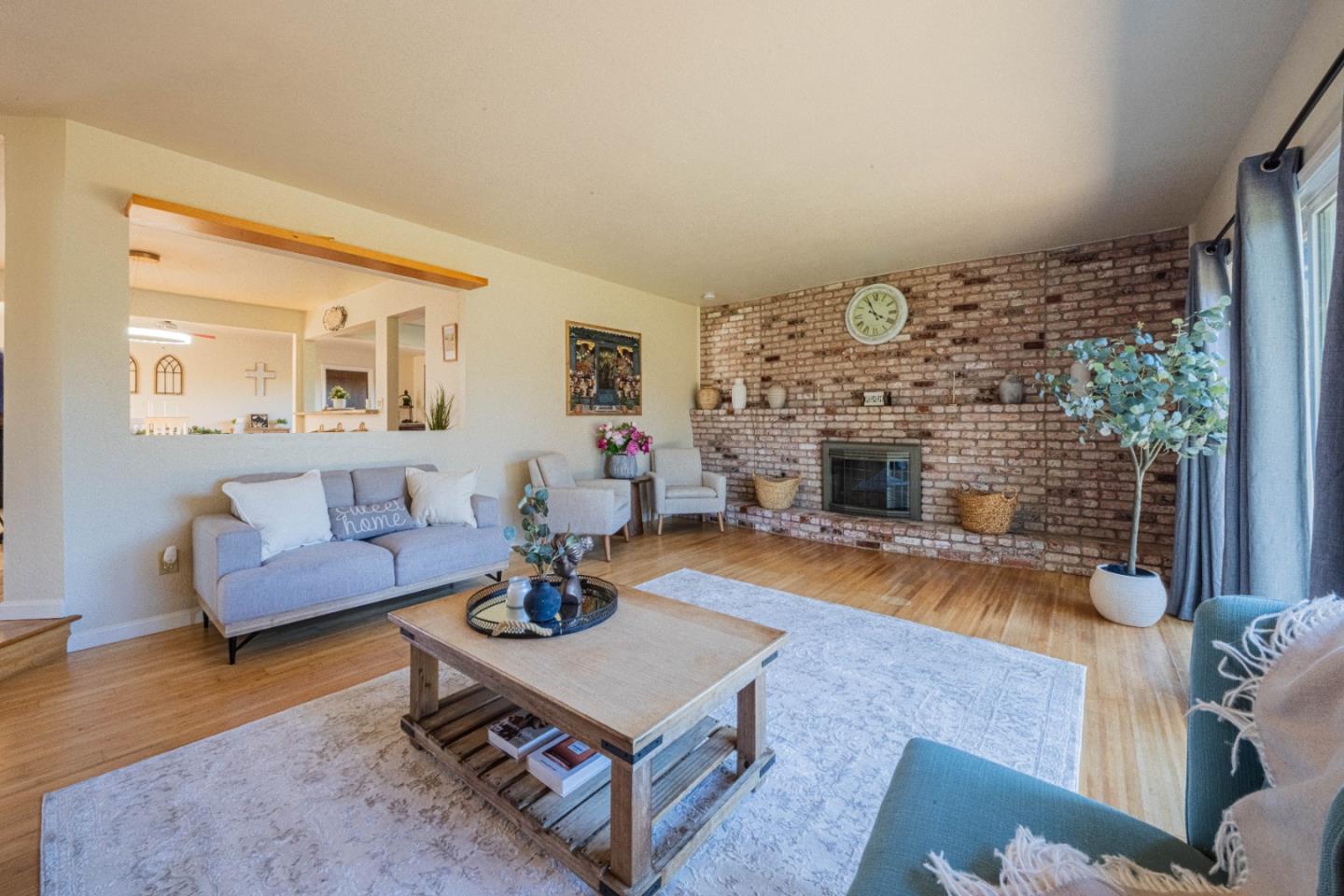 9919 Mimosa Path Salinas, CA 93907 - Photo 11 of 39 a living room with furniture and a fireplace