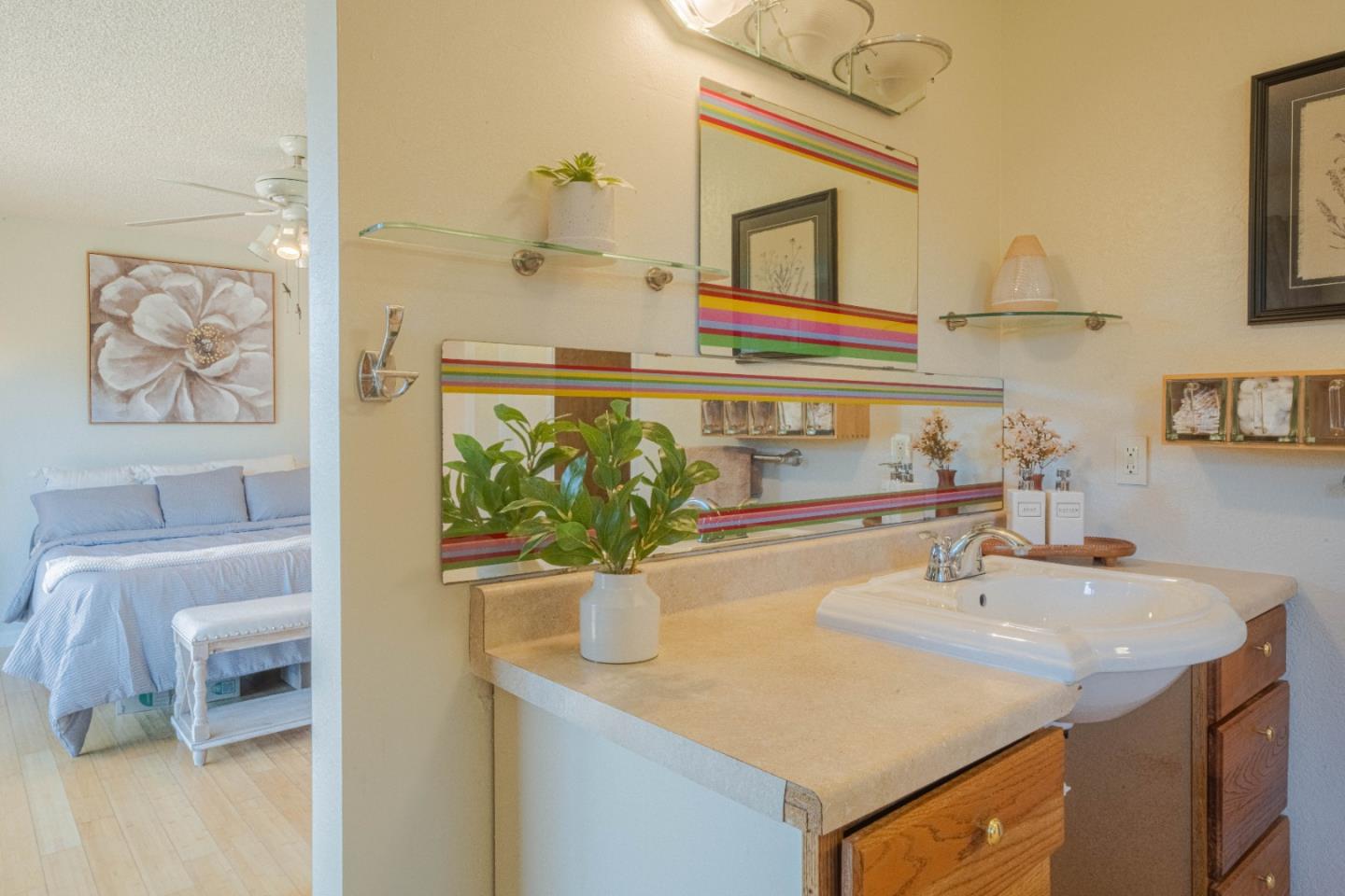 9919 Mimosa Path Salinas, CA 93907 - Photo 23 of 39 a bathroom with a sink and a mirror