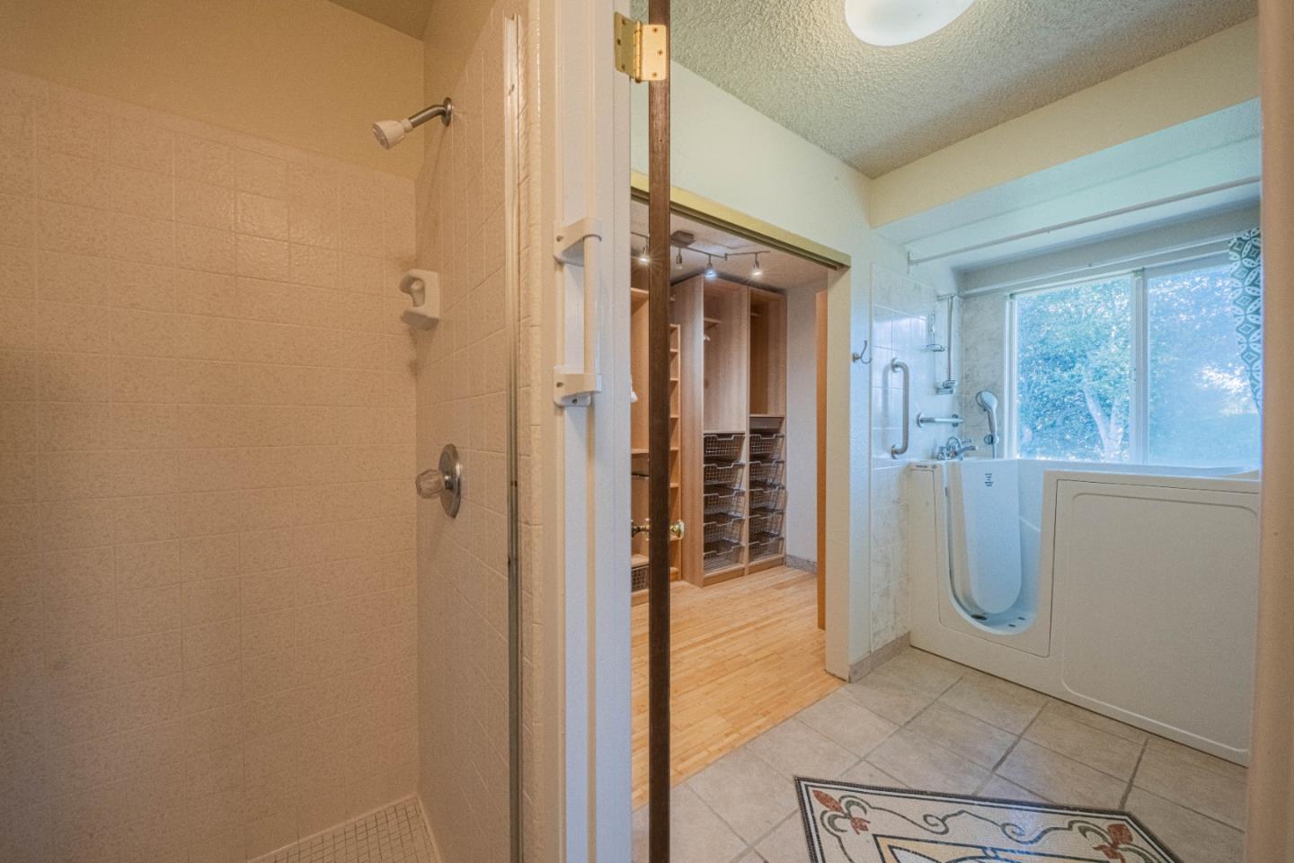 9919 Mimosa Path Salinas, CA 93907 - Photo 24 of 39 a view of entryway with bathroom and shower