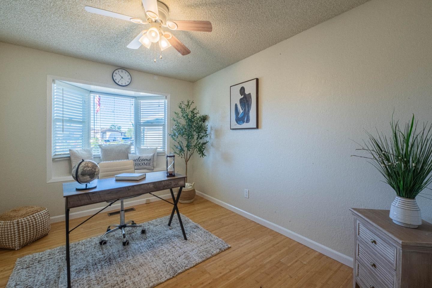 9919 Mimosa Path Salinas, CA 93907 - Photo 28 of 39 a workspace with furniture and a potted plant