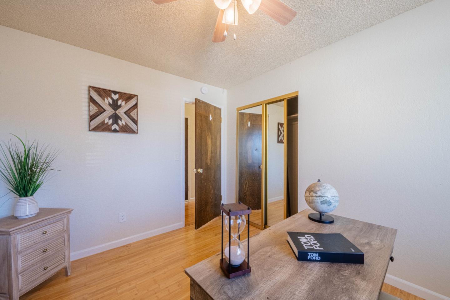9919 Mimosa Path Salinas, CA 93907 - Photo 29 of 39 a living room with furniture and wooden floor