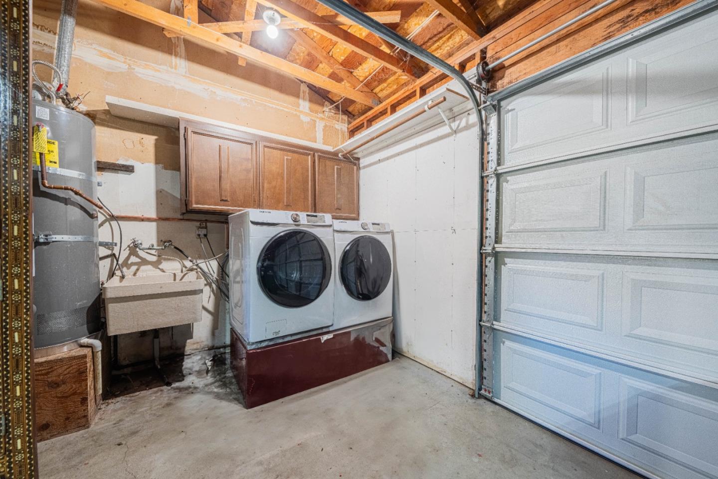 9919 Mimosa Path Salinas, CA 93907 - Photo 34 of 39 a utility room with dryer and washer